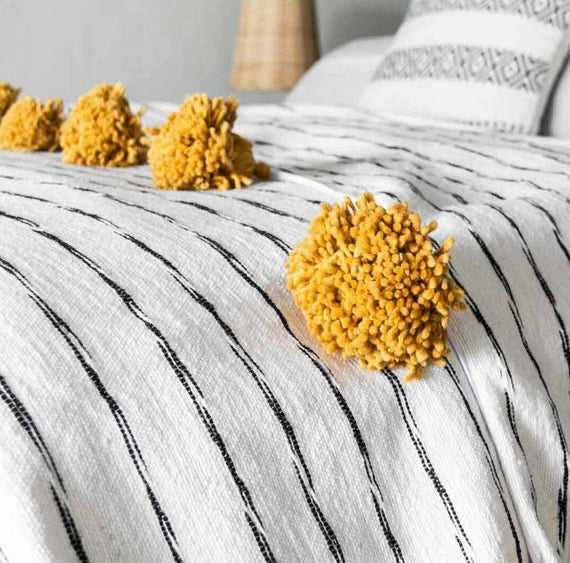 POM POM BLANKET WHITE WITH BLACK STRIPES & MUSTARD TASSELS