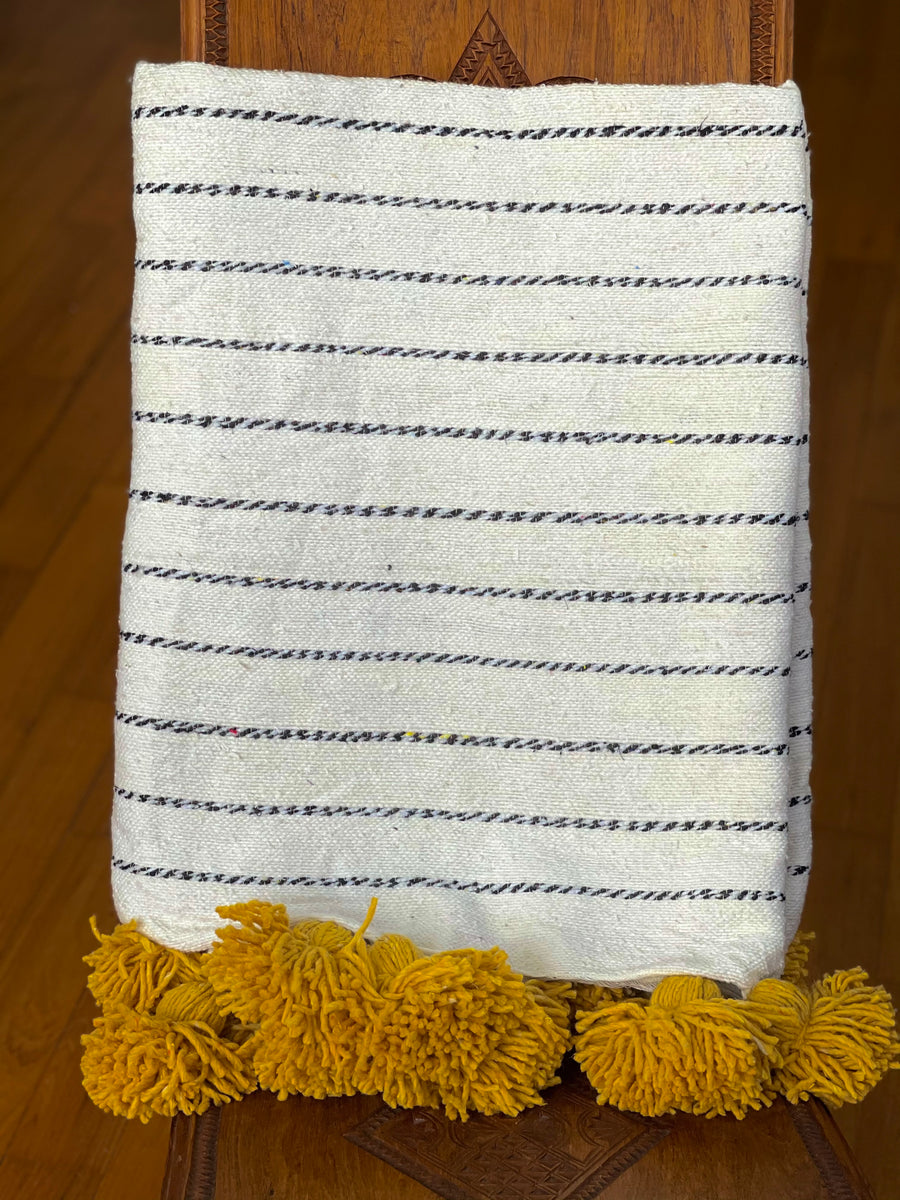 POM POM BLANKET WHITE WITH BLACK STRIPES & MUSTARD TASSELS